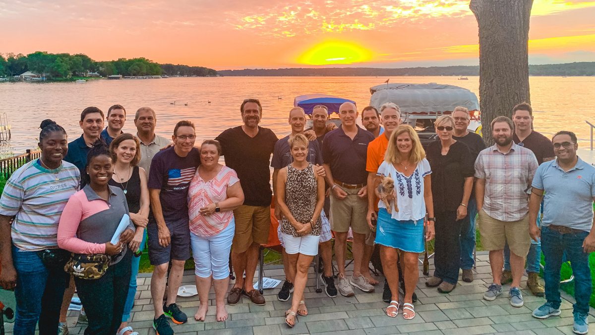 Milwaukee REIA Mentoring members together at a lakeside summer gathering
